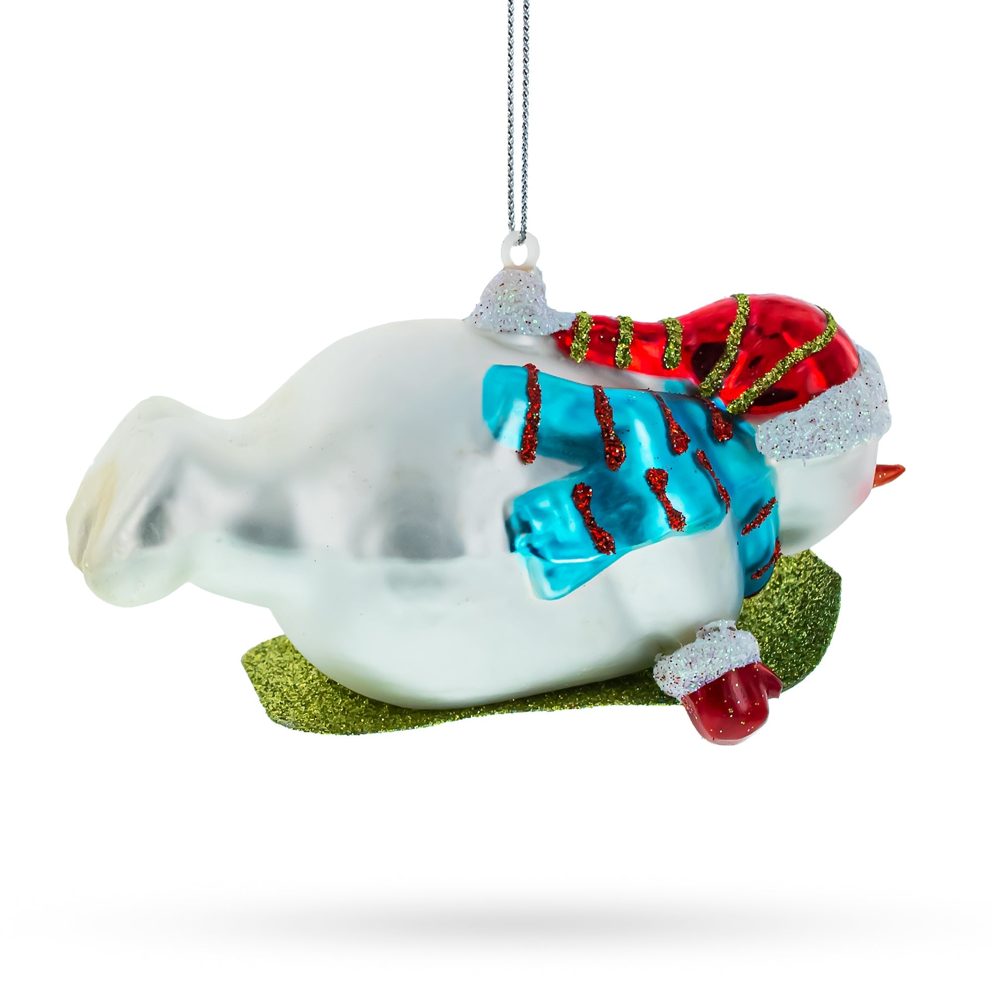 Snowman Gleefully Riding A Sled - Blown Glass Christmas Ornament