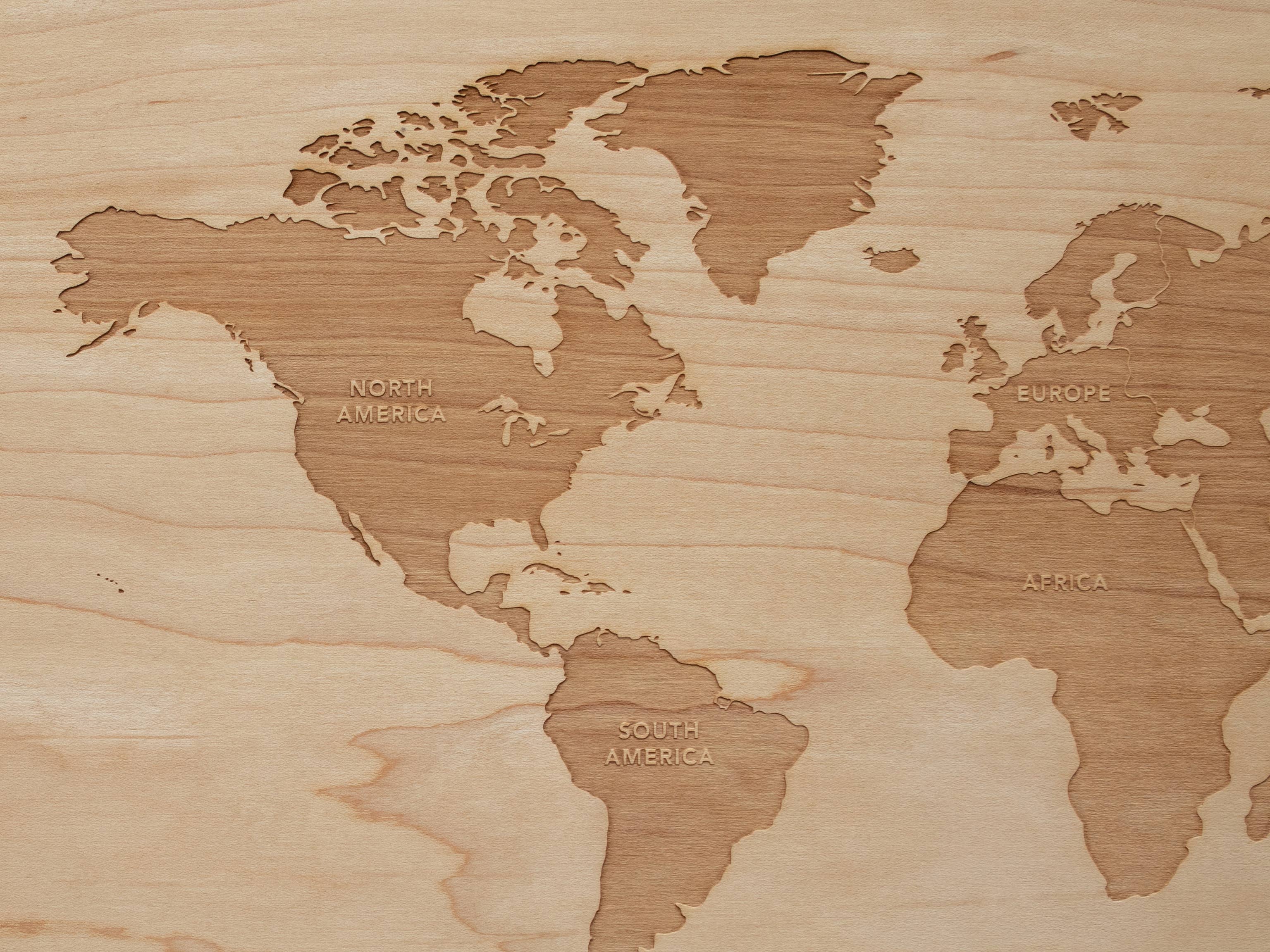 Wooden World Map Engraved On Wood With World's Continents
