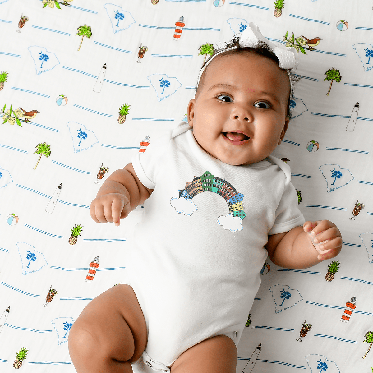 Charleston Rainbow , South Carolina Newborn Gift Bundle: Swaddle, Bib & Onesie