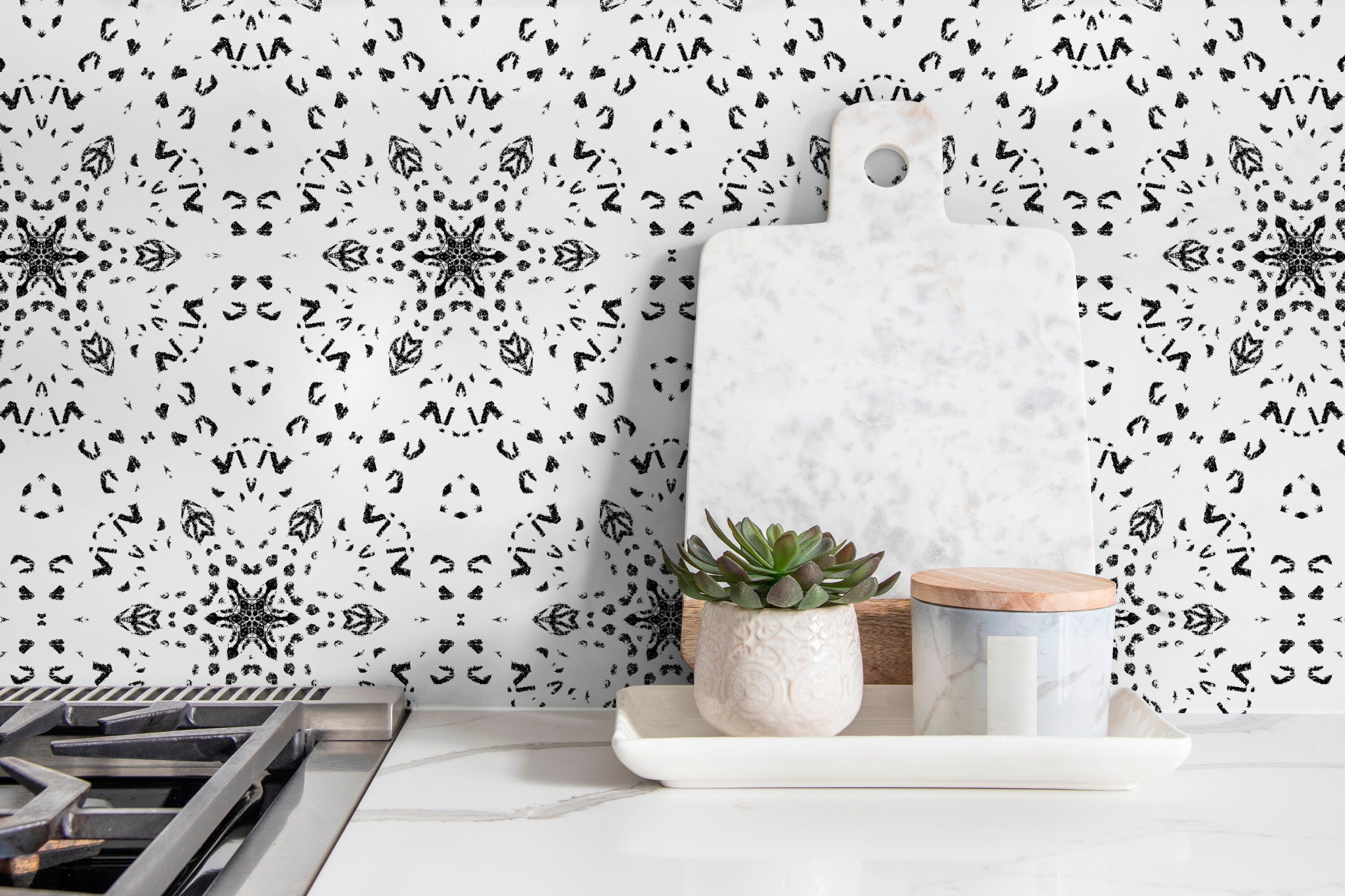 Geometric Wallpaper With A Stamped Kaleidoscope Motif In Black And White - X083