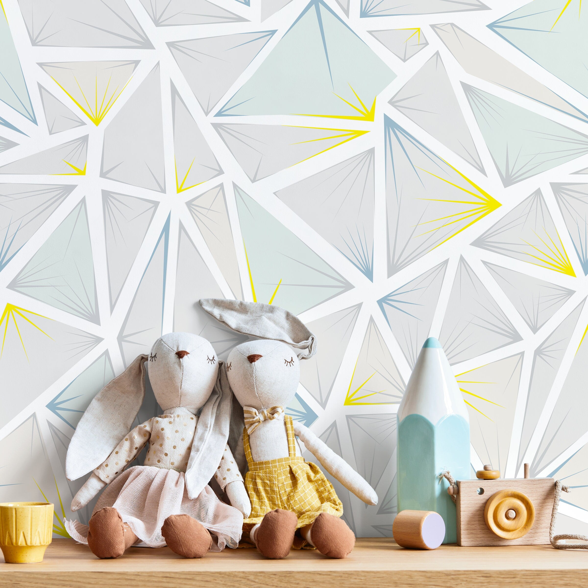 Geometric Wallpaper With A Prismatic Triangle Motif In Grey, Blue, And Yellow - A334