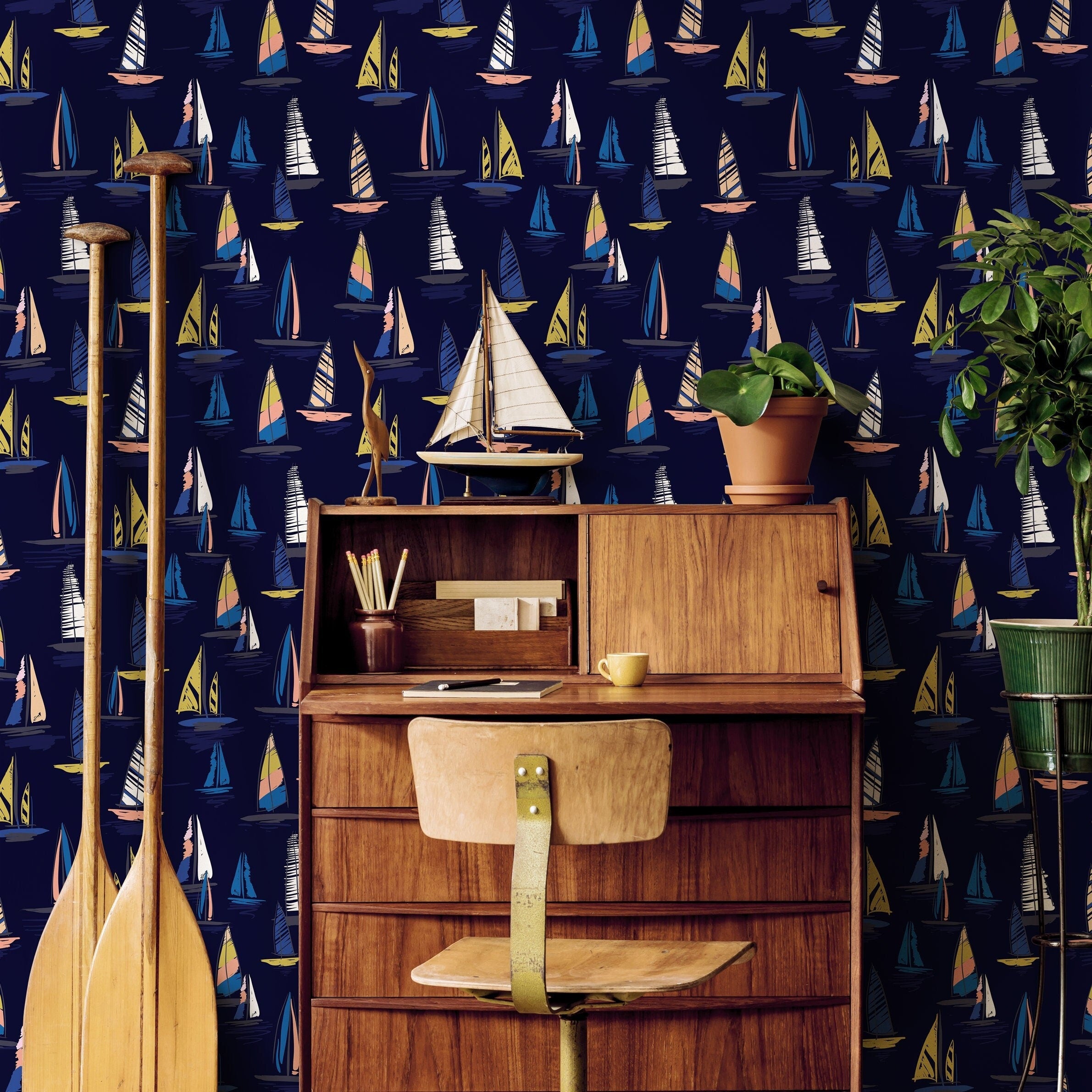 Nautical Wallpaper Featuring A Fleet Of Sailboats In Navy Blue, Yellow, And Pink - B244