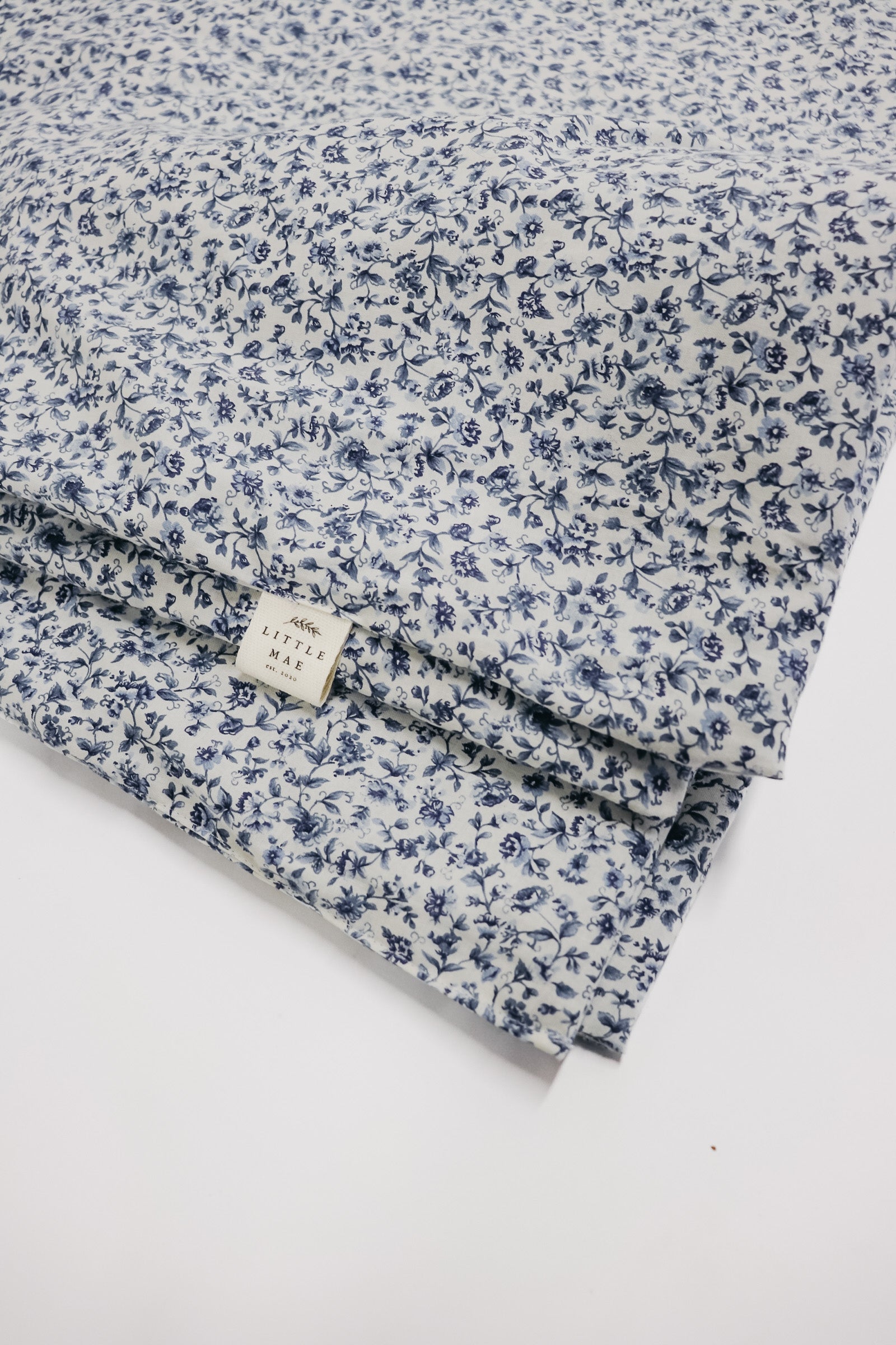 Floret Crib Quilted Blanket (Ships June 8)