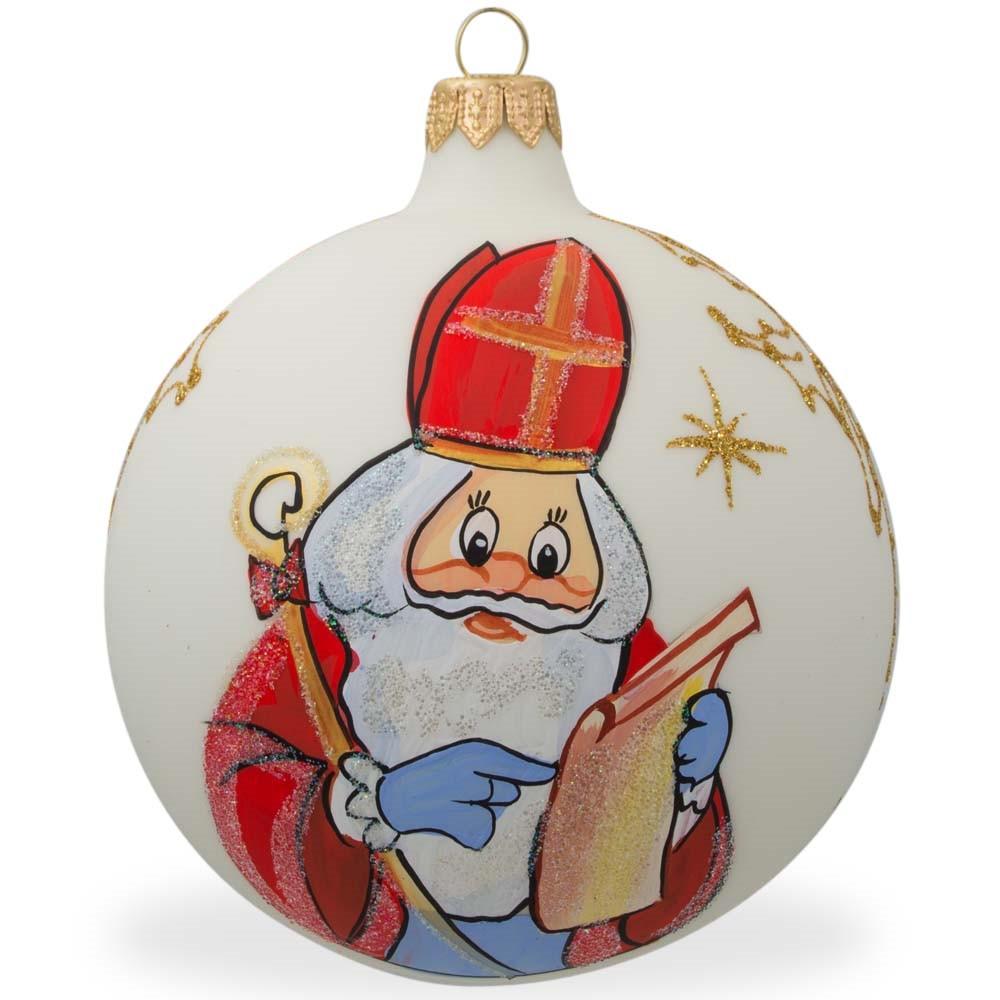 St. Nicholas Reviewing His Gift List In Winter White Blown Glass Ball Christmas Ornament 4 Inches