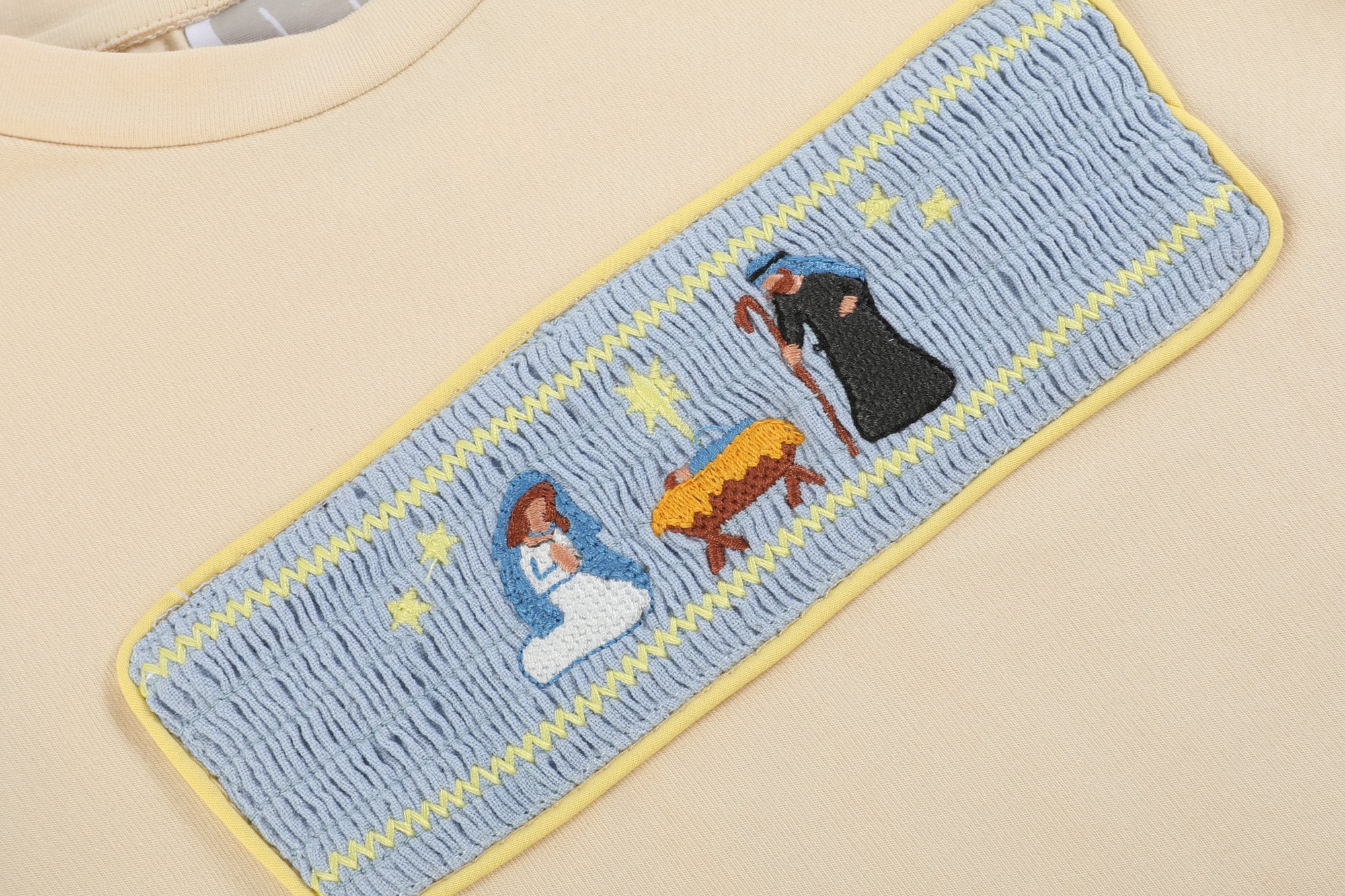 Light Brown Nativity Smocked Shirt And Blue Pants
