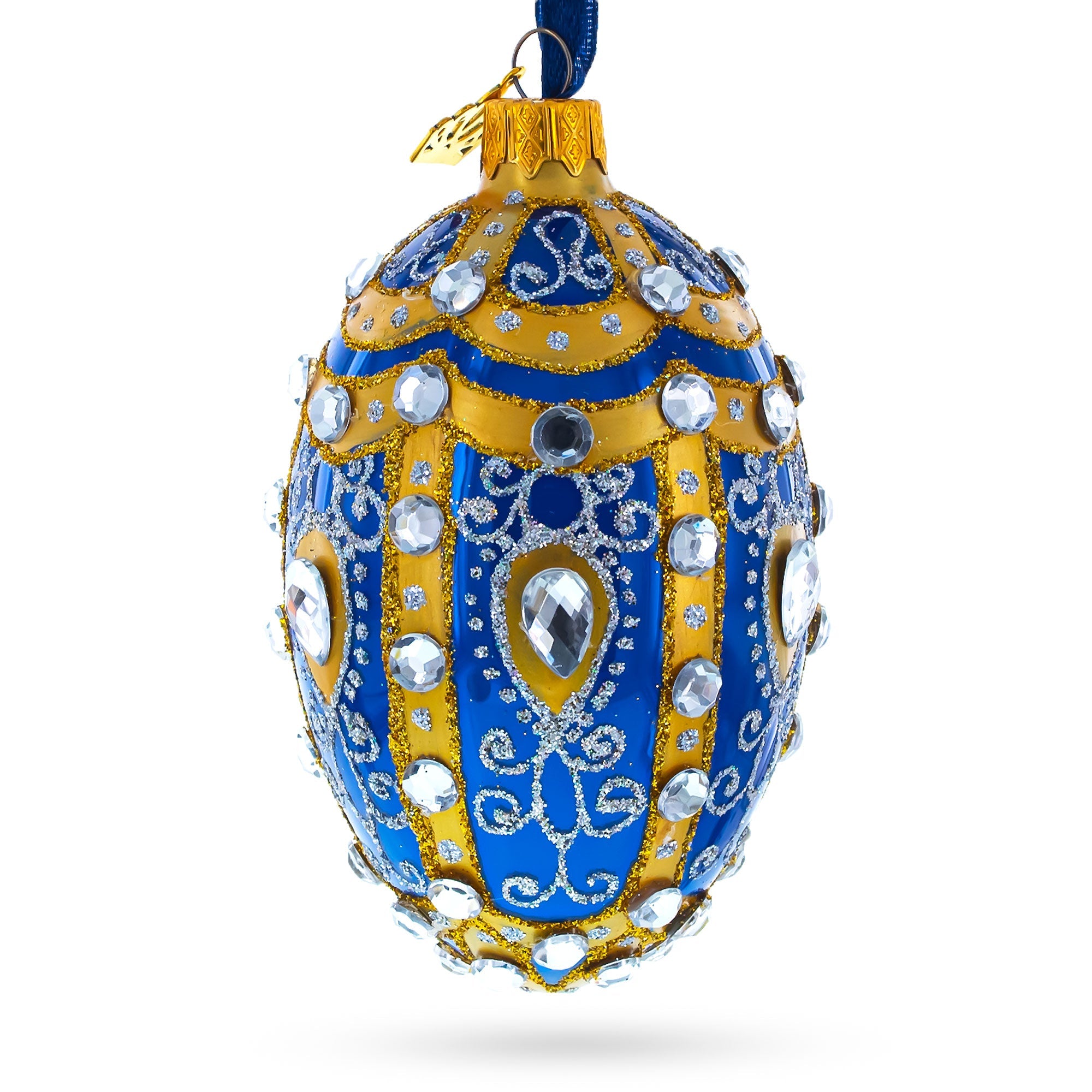 White Scrolls On Blue Glass Egg Ornament 4 Inches