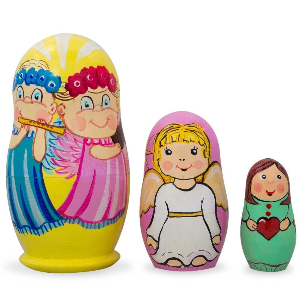 Set Of 3 Guardian Angels With Flute, Heart Wooden Nesting Dolls 4.25 Inches