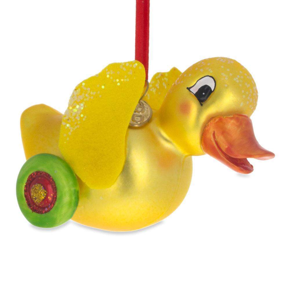 Yellow Duck Rolling On Wheels - Blown Glass Christmas Ornament