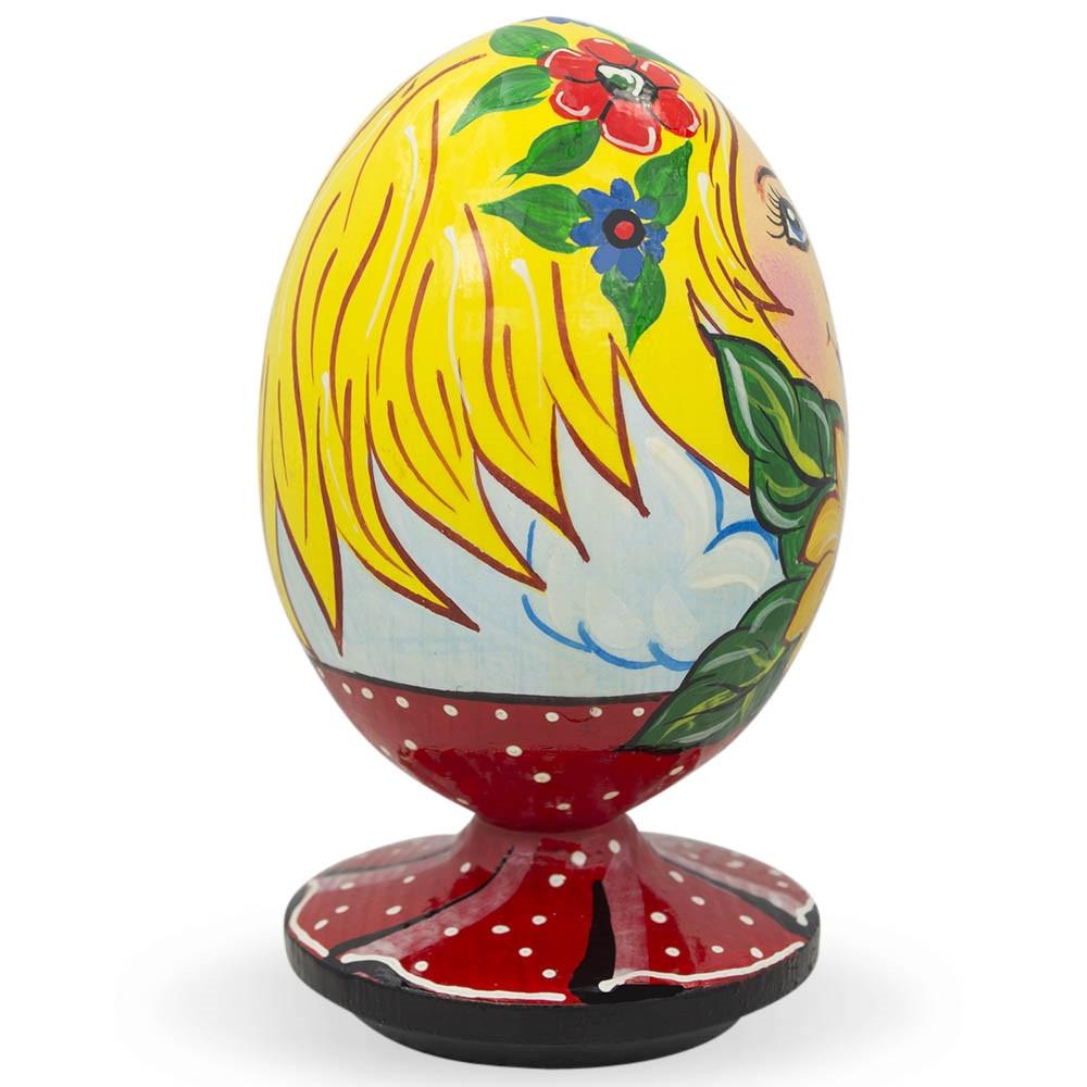 Ukrainian Girl With Sunflower Wooden Egg Figurine