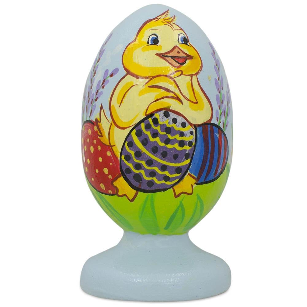 Duck Holding Easter Egg Wooden Figurine