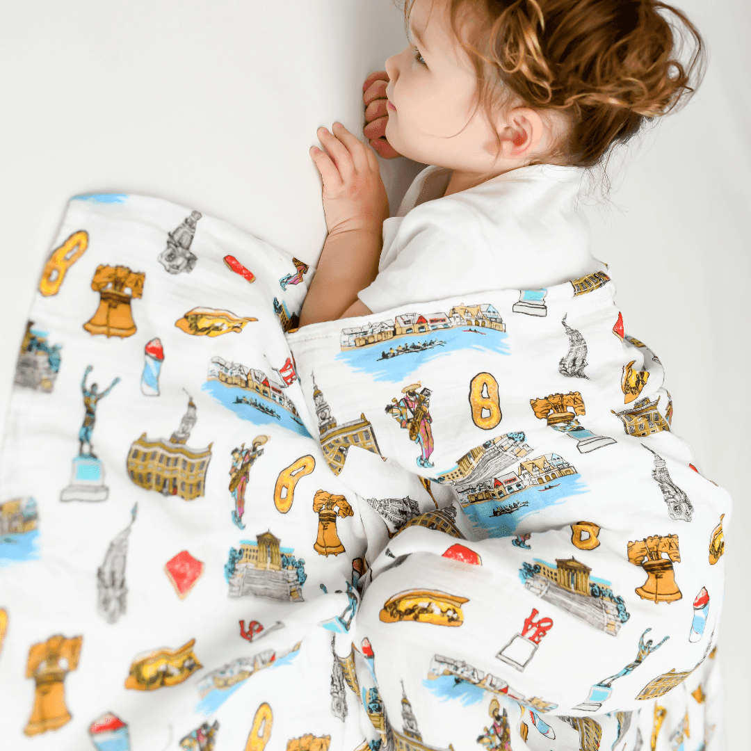Philadelphia Newborn Gift Bundle: Swaddle, Bib & Onesie
