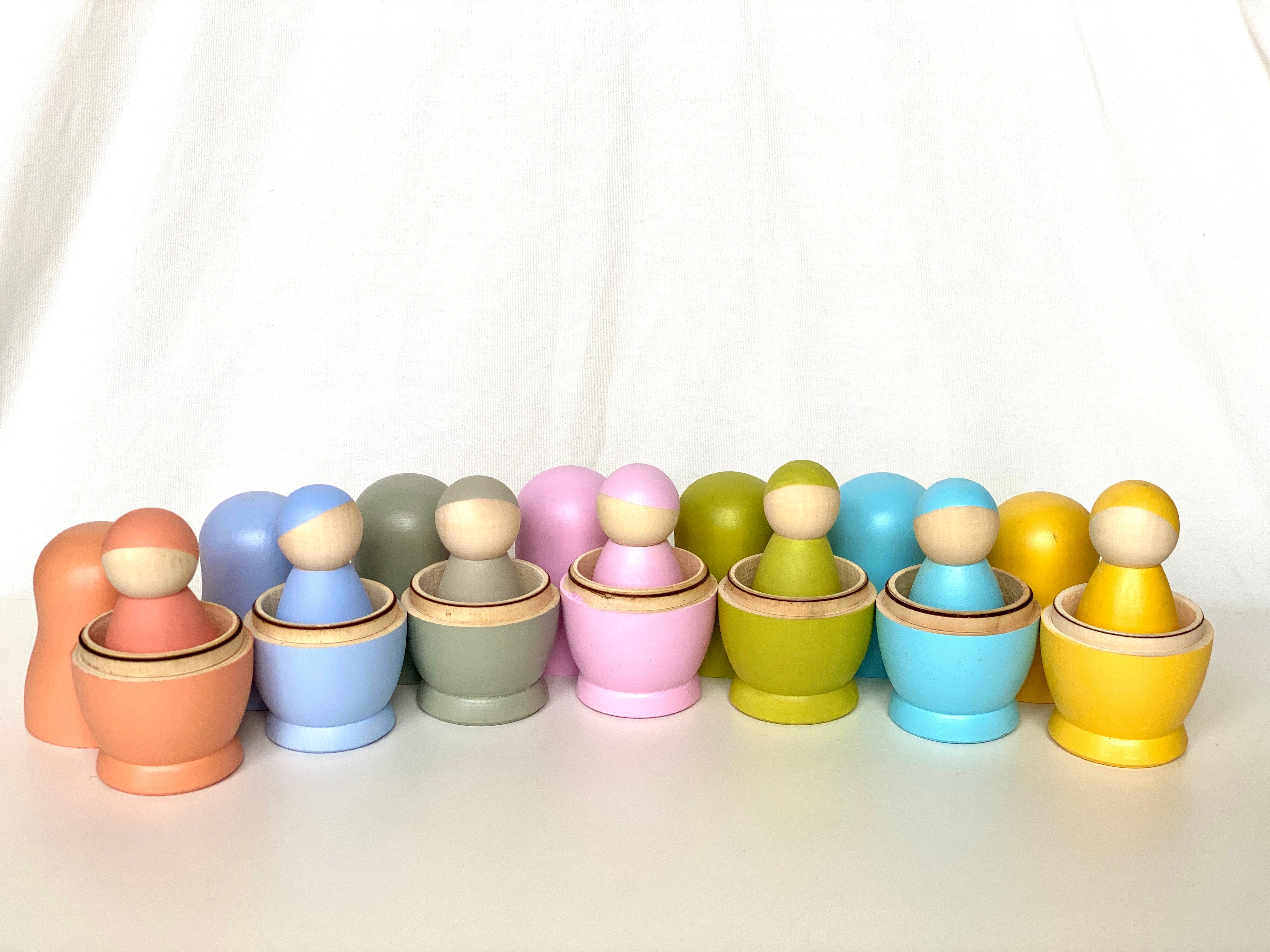 Wooden Nesting Dolls With Pegs Pastel