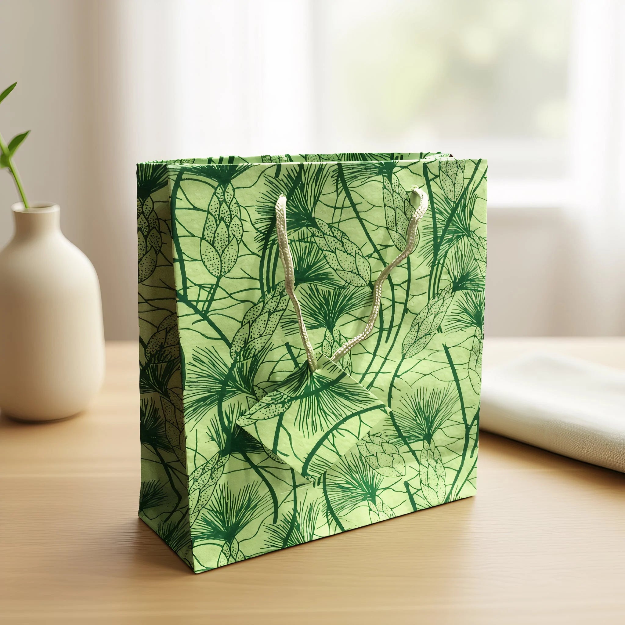 Set Of Six Recycled Cotton Gift Bags With Tag In Green Beach Grass Design