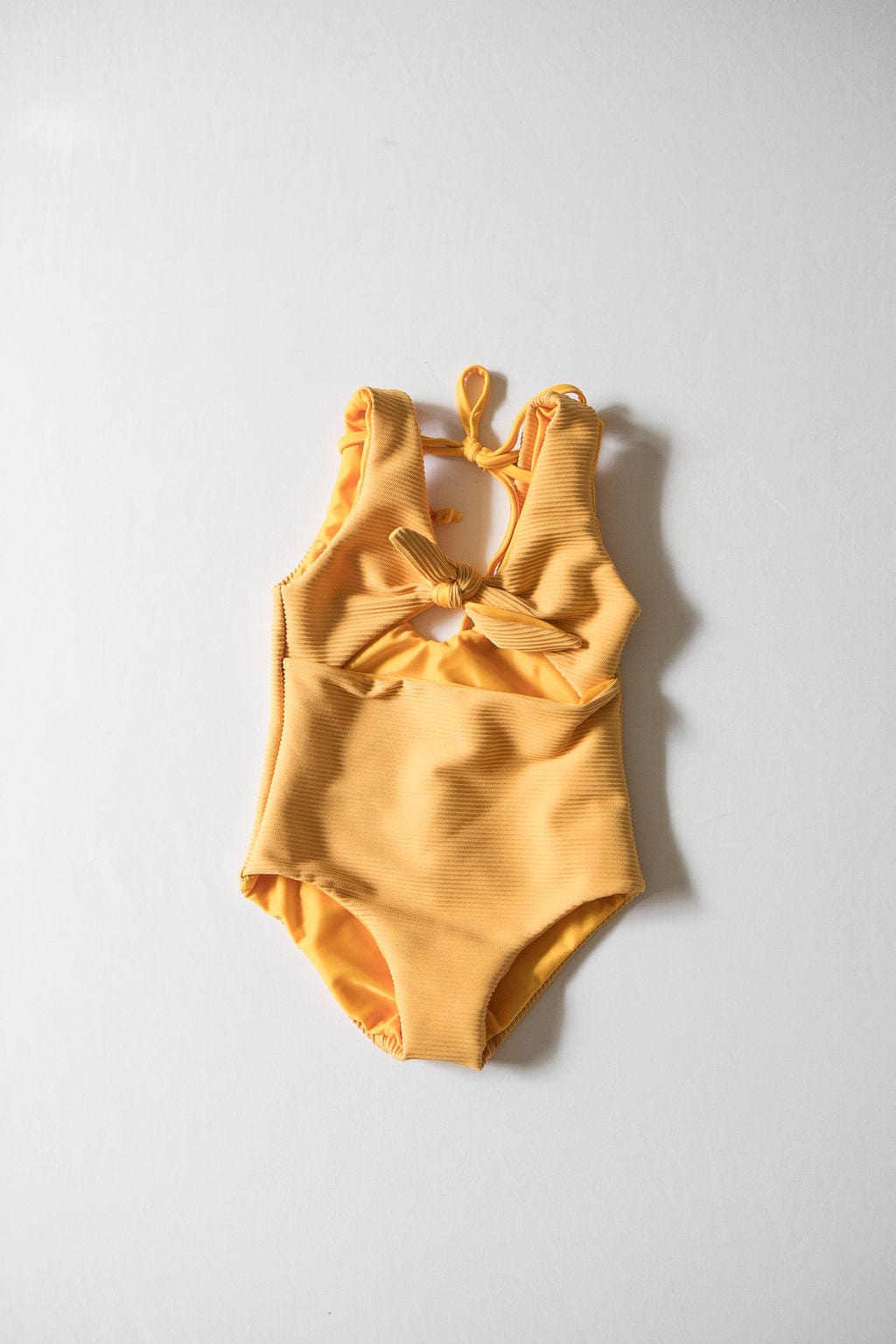 Girl's Cutout One Piece In Yellow Ribbed