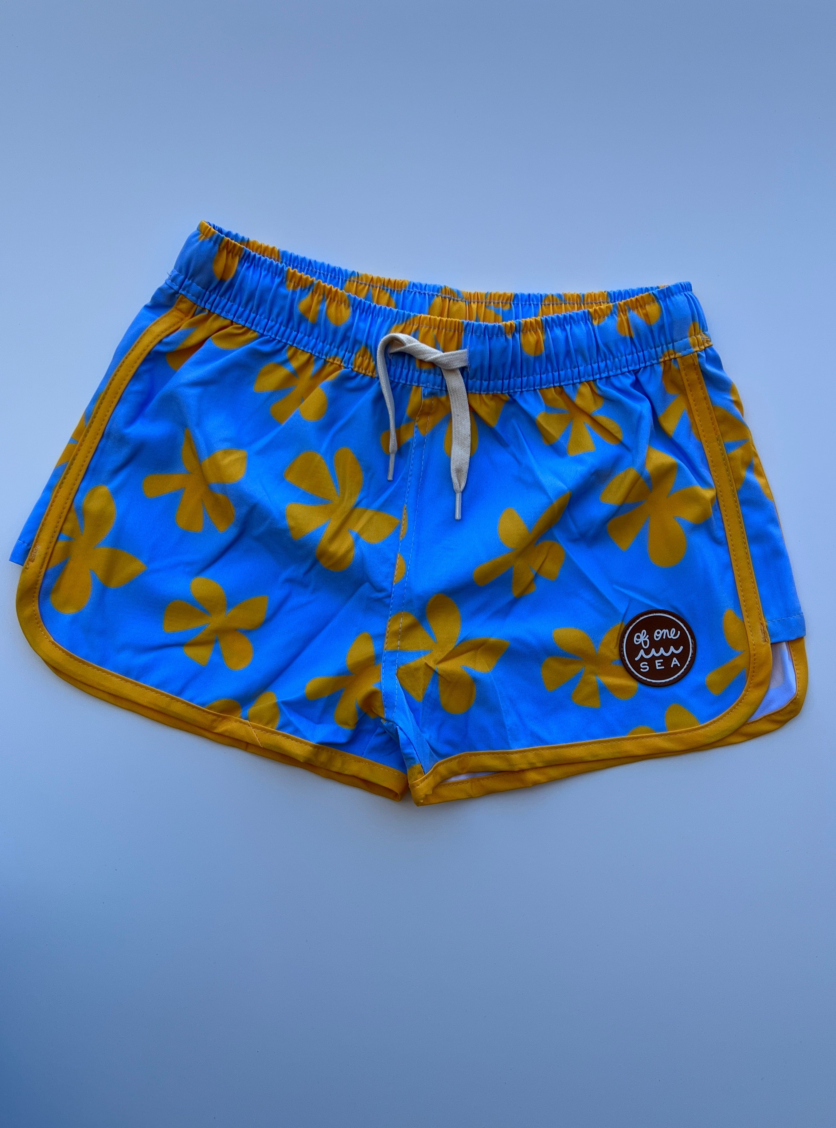 Kid’s Boardie Watershorts In Light Blue Plumeria